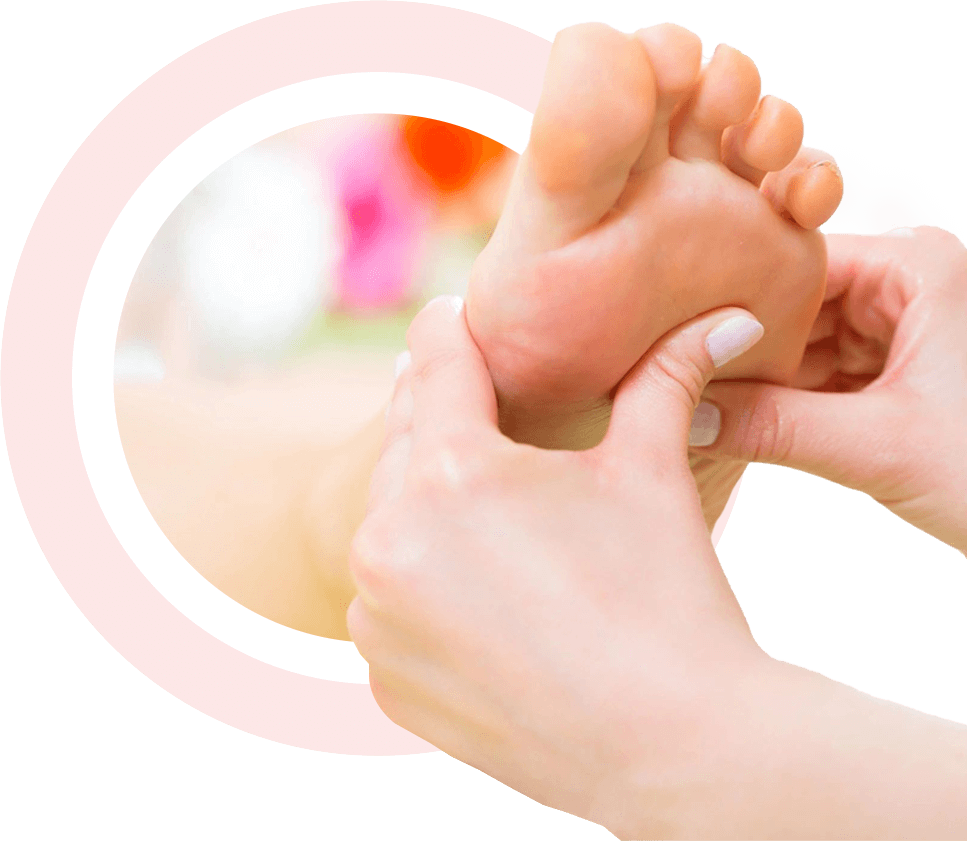 Woman in nail salon receiving foot massage